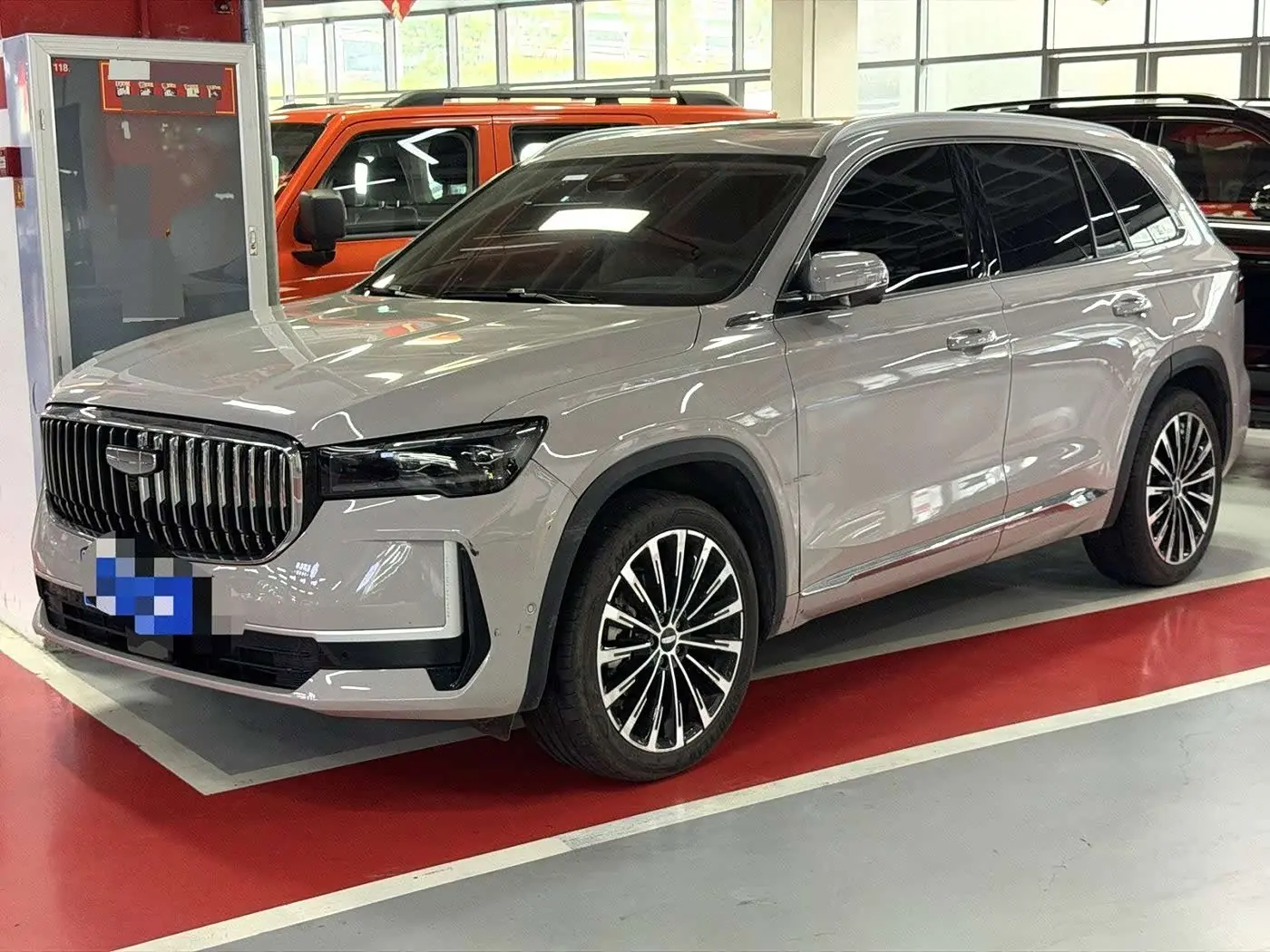 Geely Xingyue L 2024 — Фото 1/9