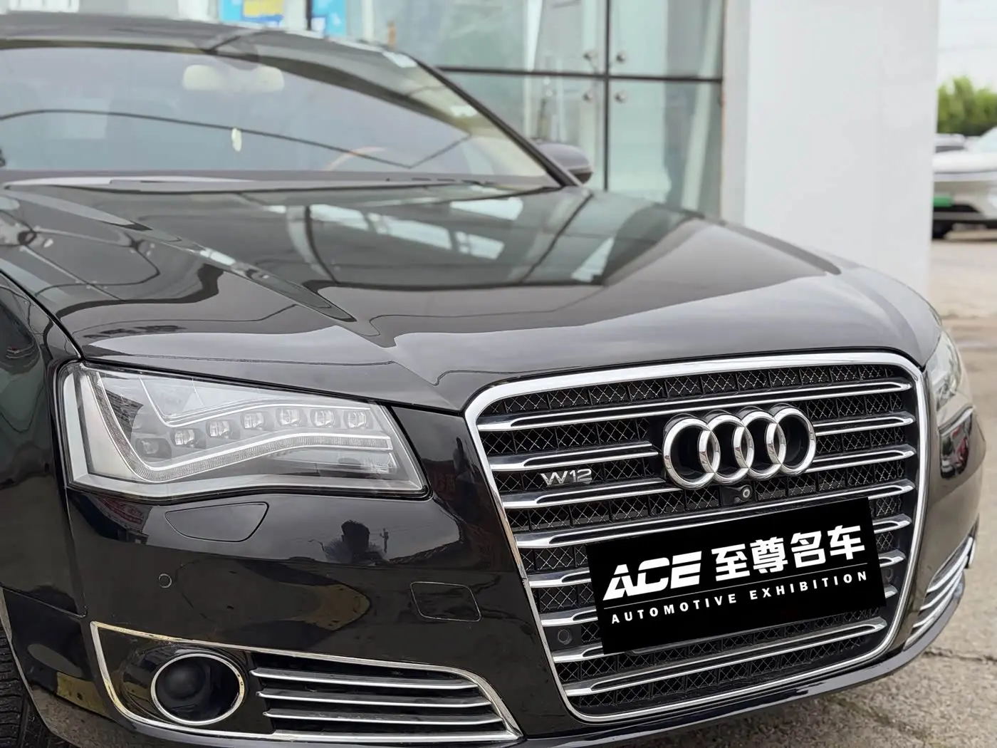 Audi A8 2011 — ფოტო 7/20