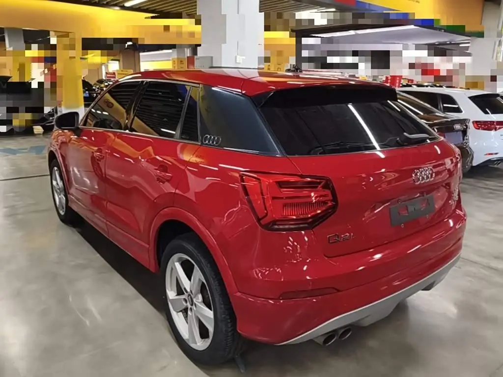 Audi Q2L 2019 — Фото 5/20