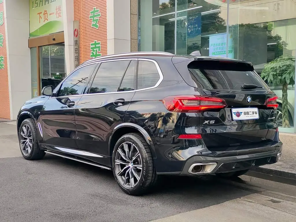 BMW X5 2022 — Фото 4/11