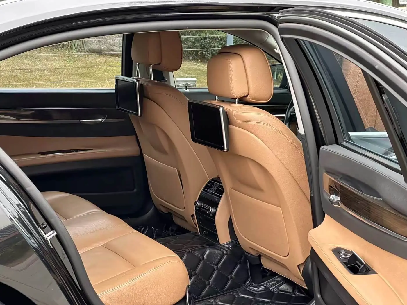 BMW 7 Series 2013 — Фото 7/17