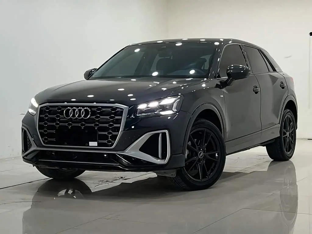 Audi Q2L 2023 — Şəkil 1/12