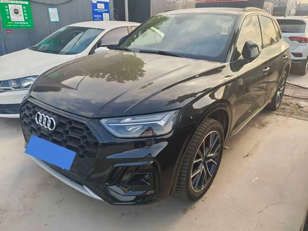 Audi Q5L 2024 — ფოტო 1/9