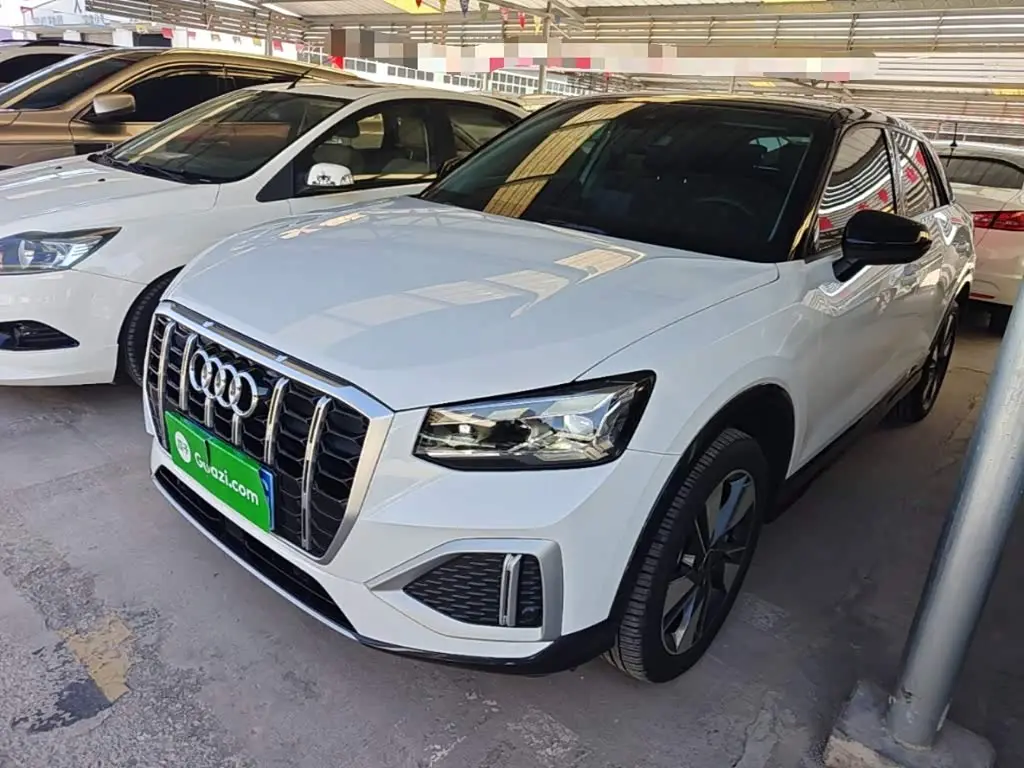 Audi Q2L 2022 — Фото 1/20