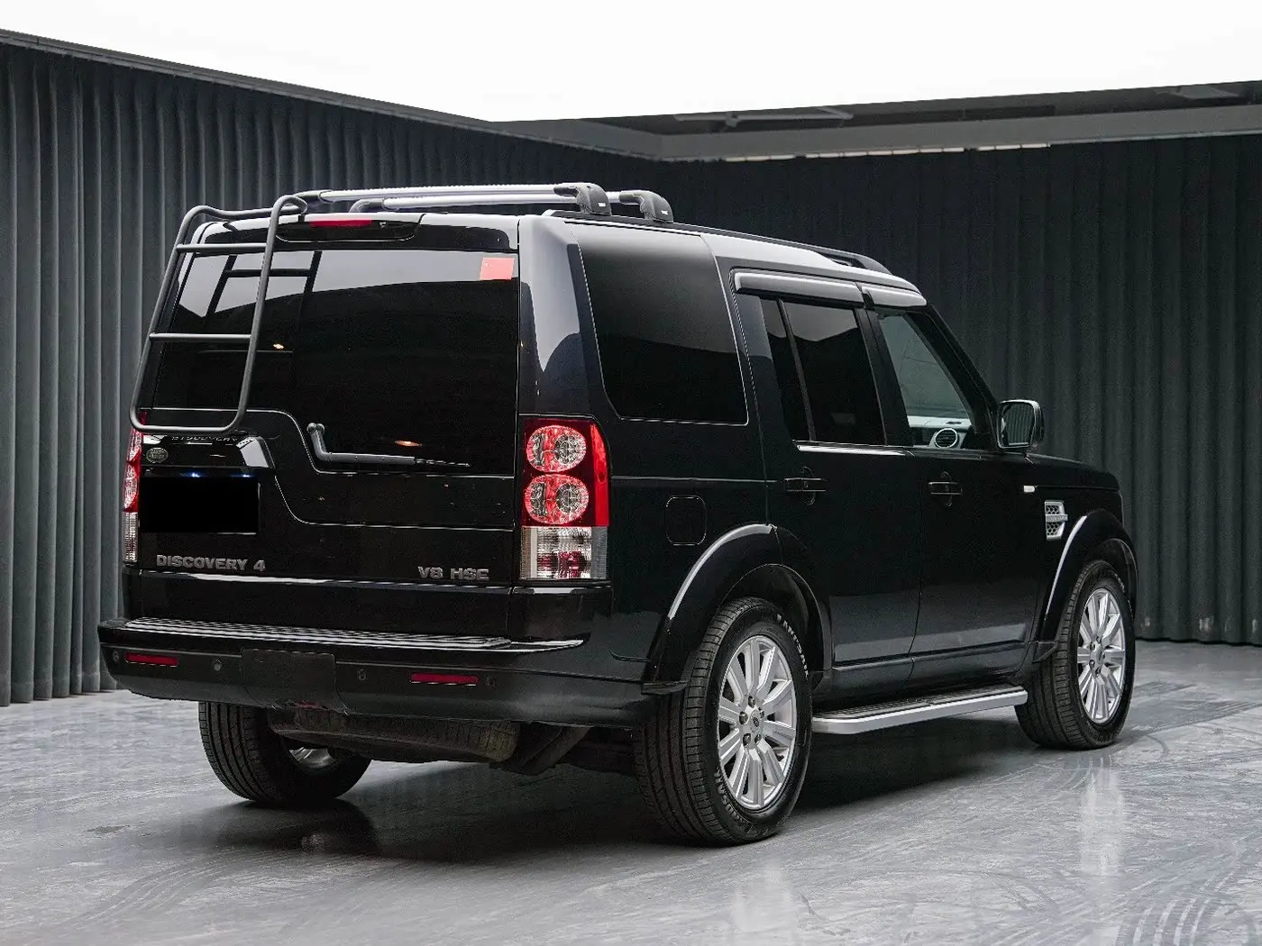 Land Rover Discovery 2012 — Фото 7/11