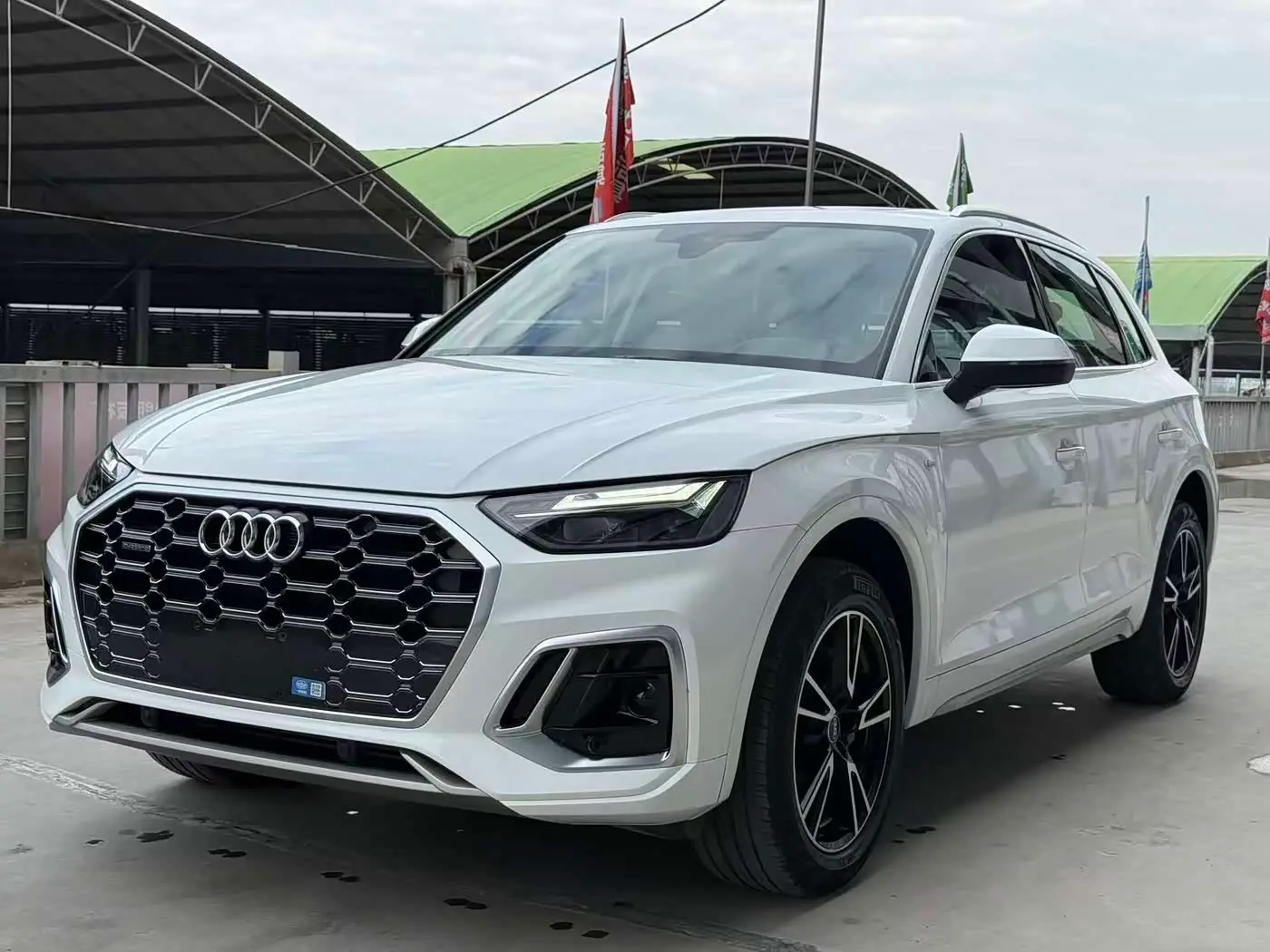 Audi Q5L 2024 — Photo 1/16