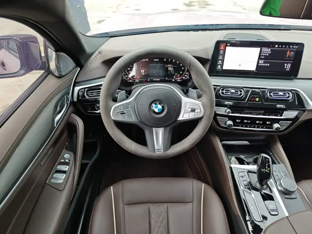 BMW 5 Series 2023 — Фото 10/19