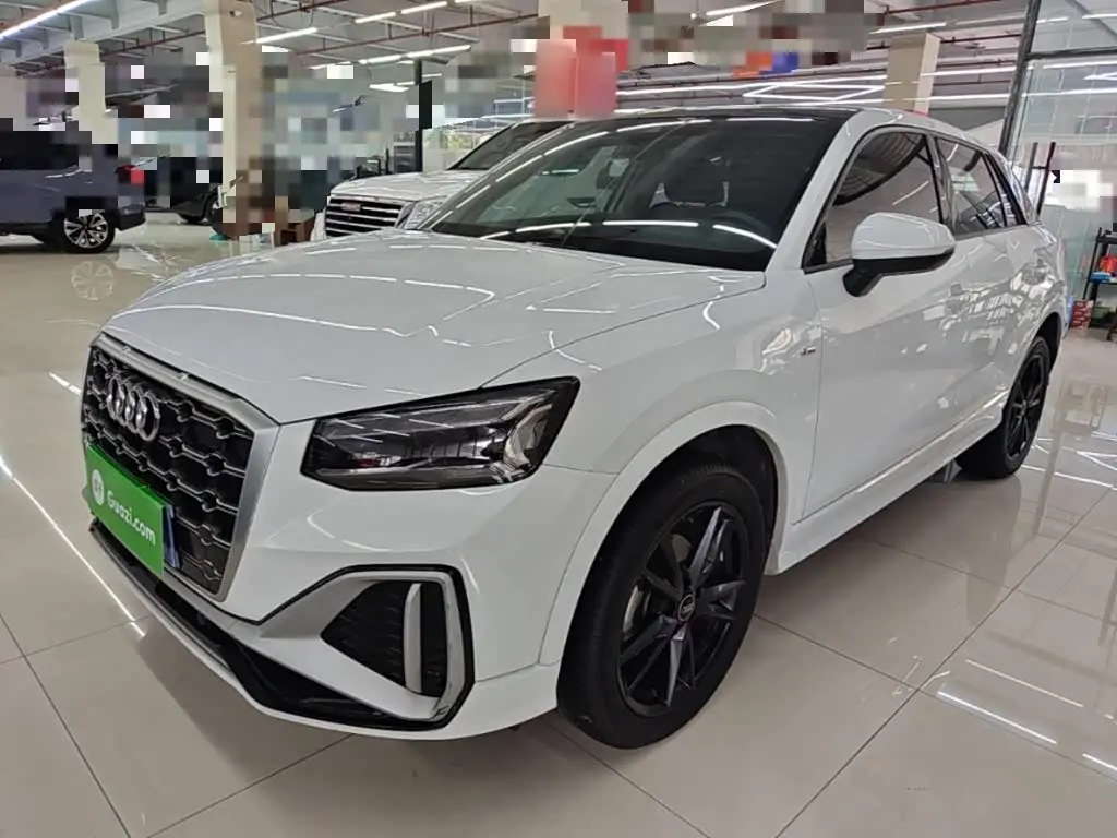 Audi Q2L 2023 — Фото 2/20