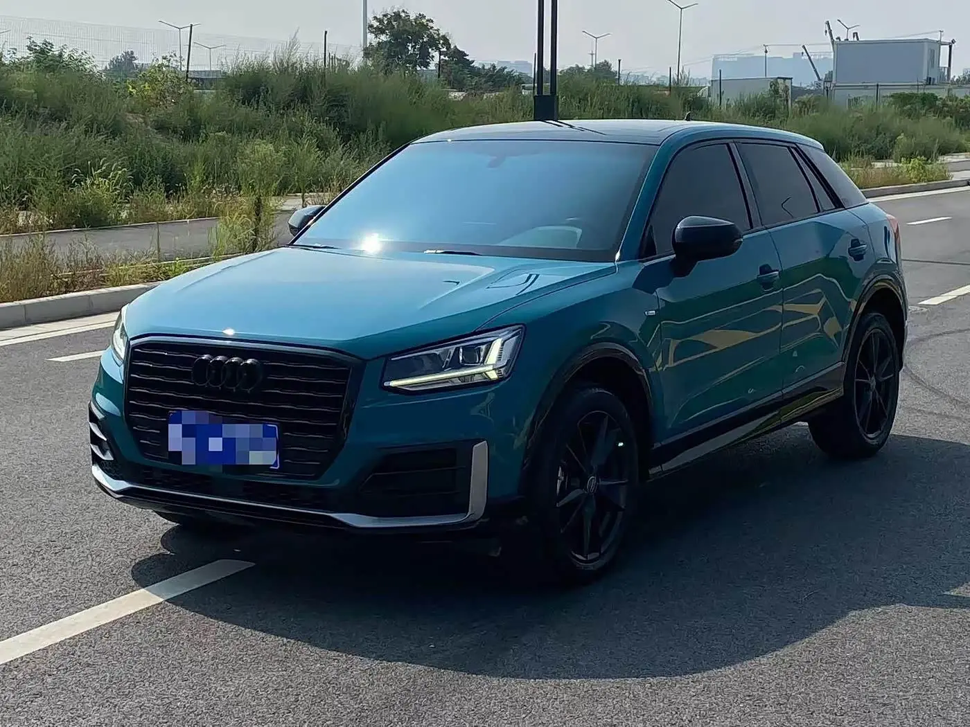 Audi Q2L 2021 — Фото 1/9