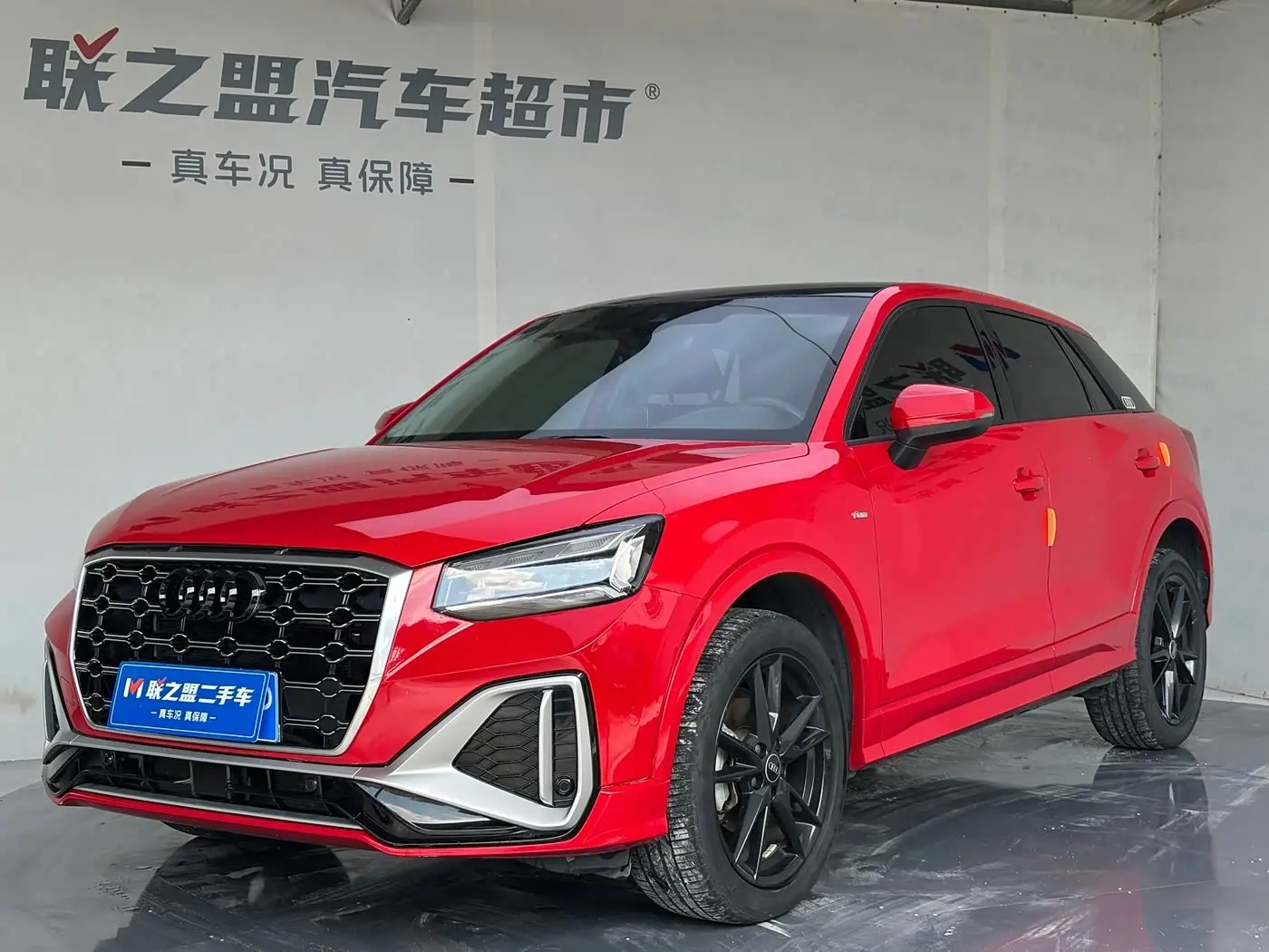 Audi Q2L 2022 — Фото 1/20