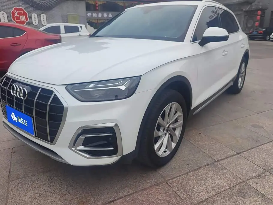 Audi Q5L 2024 — Photo 1/16