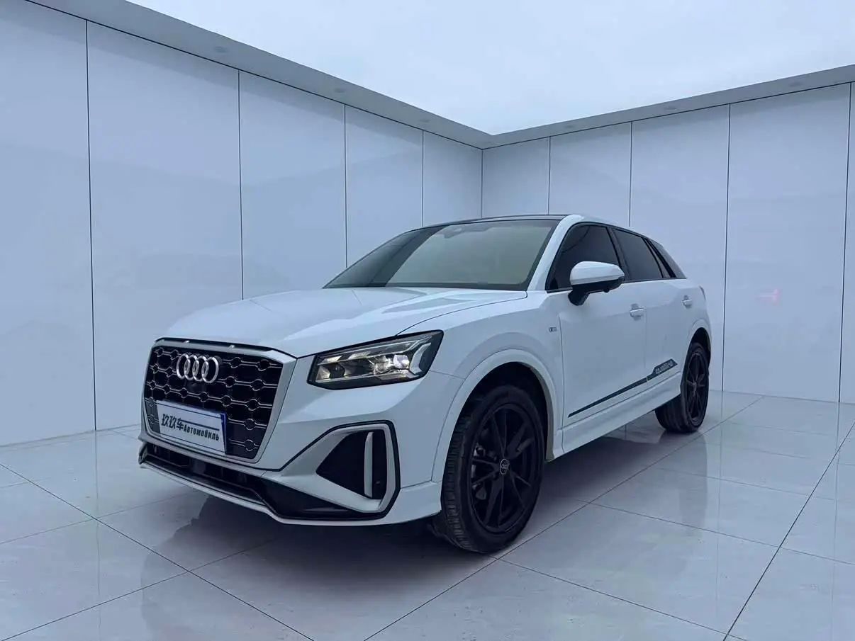 Audi Q2L 2022 — Фото 1/16