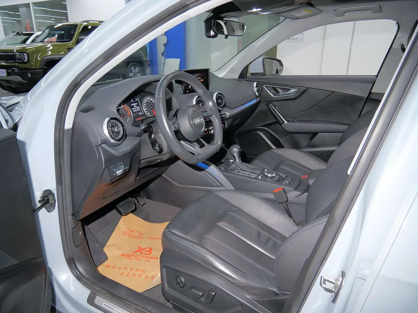 Audi Q2L 2022 — Şəkil 13/16
